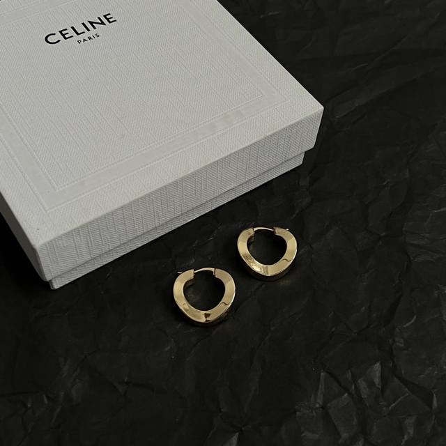 Celine earrings have always been a benchmark in minimalist fashion. Their bold d Celine earrings have always been a benchmark in minimalist fashion. Their bold d