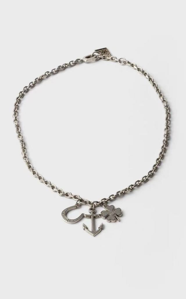 Prada's newest and most popular necklace is exquisite, timeless, and glamorous. Prada's newest and most popular necklace is exquisite, timeless, and glamorous.