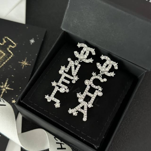 Chanel Double C Swarovski Asymmetrical Star Earrings. A must-have classic double Chanel Double C Swarovski Asymmetrical Star Earrings. A must-have classic double