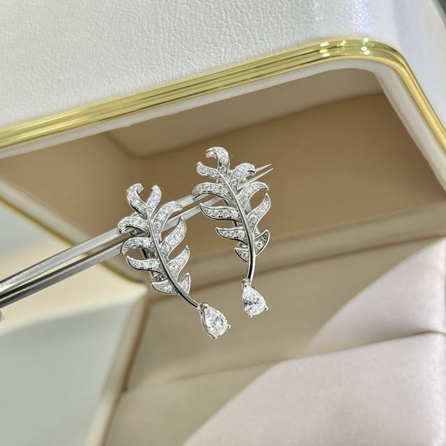 Chanel's Iconic Feather Teardrop Single Diamond Earring, Authentic With Clear En