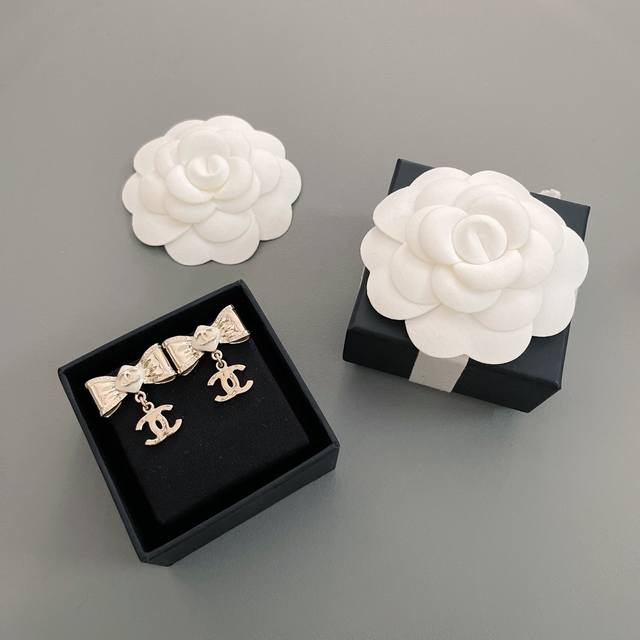 Our Product: Gold Butterfly Bow Drop Earrings Z 3900, Made From Solid Brass With