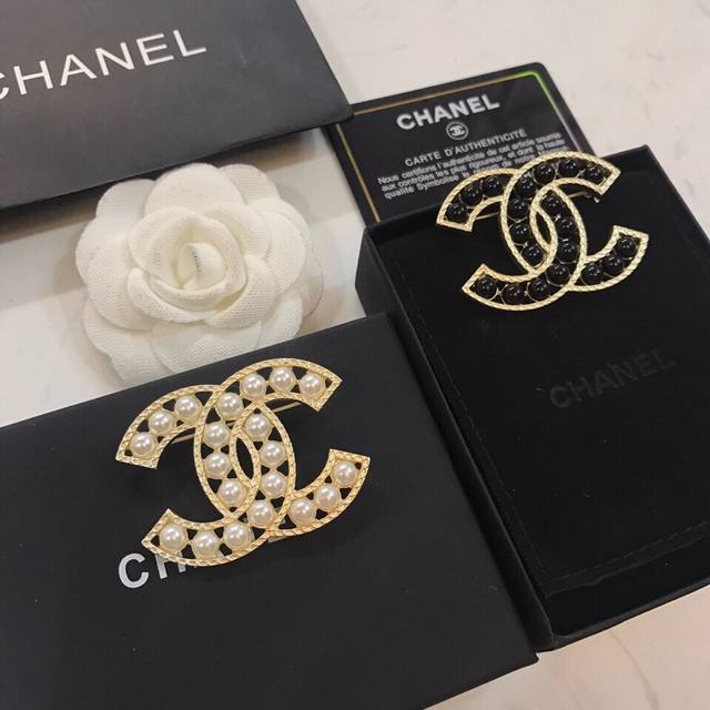 Chanel Little Black Dress Exclusive New Arrival: Chanel's Latest Brooch Design.