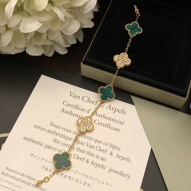Precision Craftsmanship, Absolutely Stunning!Van Cleef & Arpels New Peacock Ston