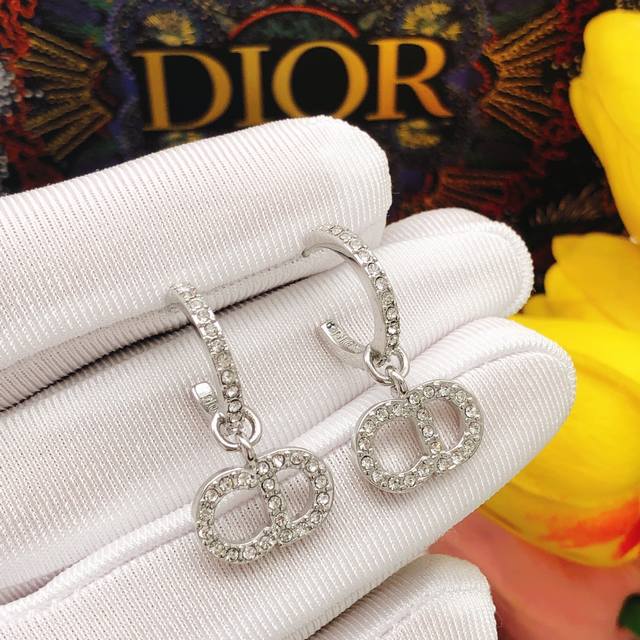Dior Silver Ear Hooks With Diamonds.