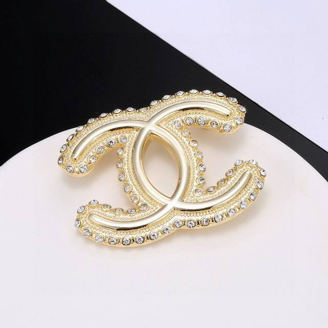 Chanel New Arrivals Now Available At The Boutique: Chanel Letter Brooches, The U