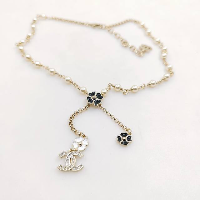 Chanel's Latest Black And White Floral Necklace, Made From Zp Brass.