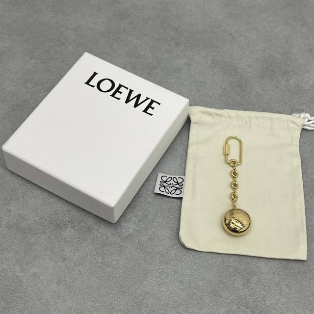 Loewe Small Gold Ball With Donut Chain, Stylish And Sophisticated. Small Gold Ba