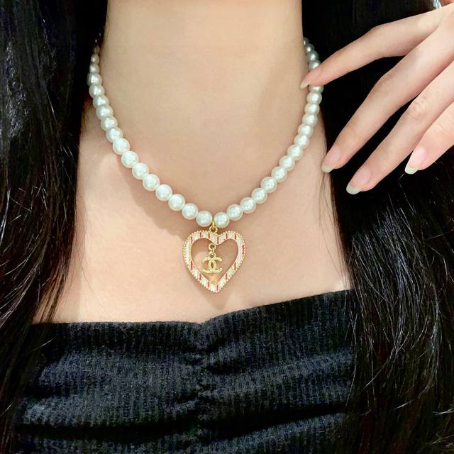 Chanel Pearl Heart Double C Necklace