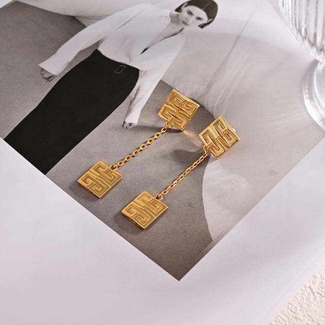 Givenchy Pendant Ear Studs. The Beloved Infinity Symbol Is Enhanced With A Touch