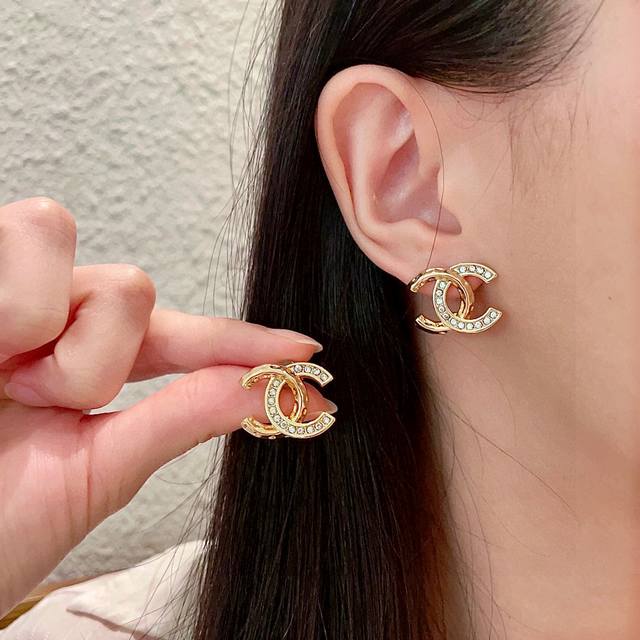 Chanel Pre-Owned Letter Earrings. Chanel's Designs Truly Need No Introduction