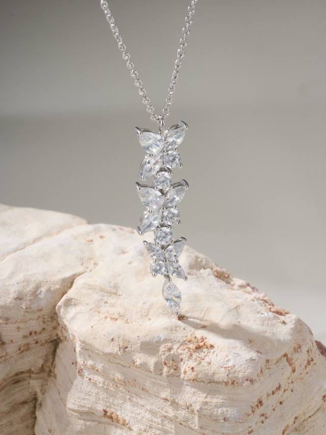 T Victoria Collection ~ A Dazzling Diamond Necklace Featuring Marquise-Cut Diamo