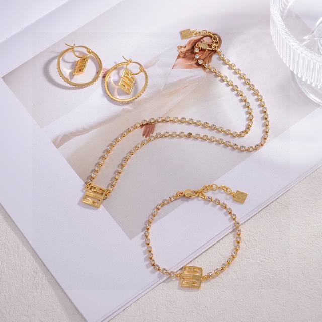 Necklace, Bracelet, And Earrings Givenchy Set.The Infinity Symbol Adds A Touch O