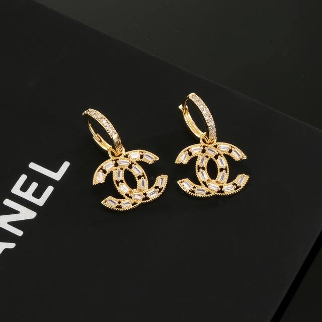 Chanel Light Gold Earrings: Stay On Trend With These Early Spring Stud Earrings.