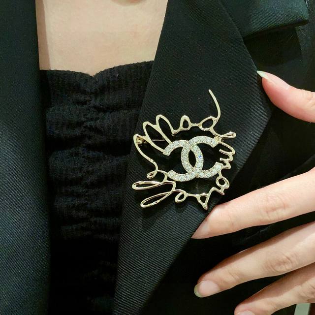 Chanel Letter Double C Diamond-Studded Brooch.