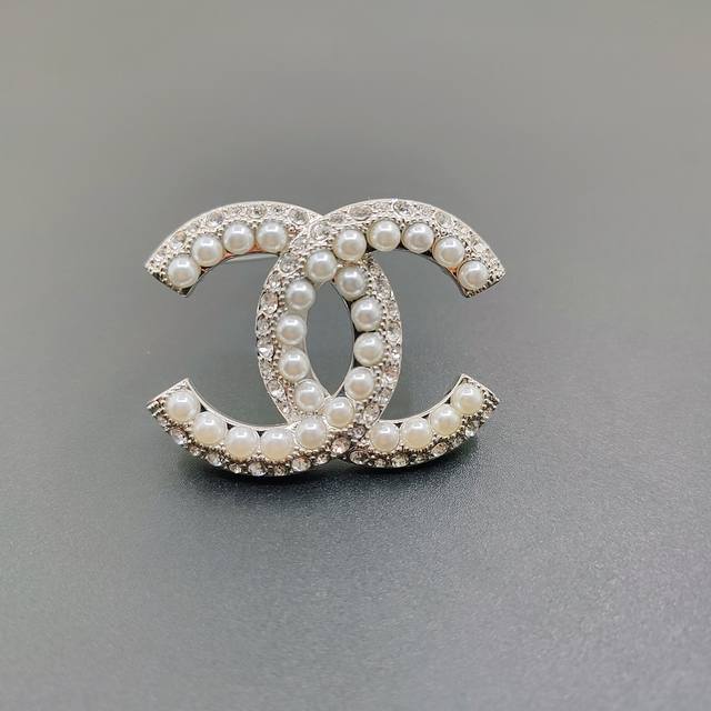 Chanel Upgraded Version Of The Small Chanel Brooch With Diamond And Pearl Detail