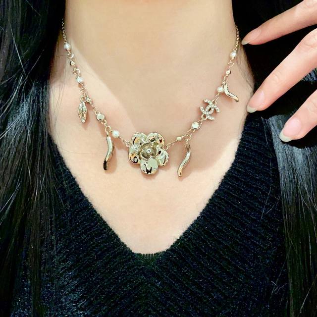 Chanel Pre-Owned Letter Necklace. Chanel's Designs Truly Need No Introduction