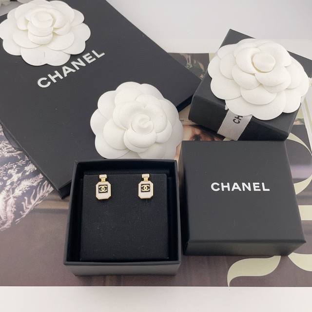 Our Product: Fragrant Mini Perfume Bottle Earrings, Purchased At A Premium Price