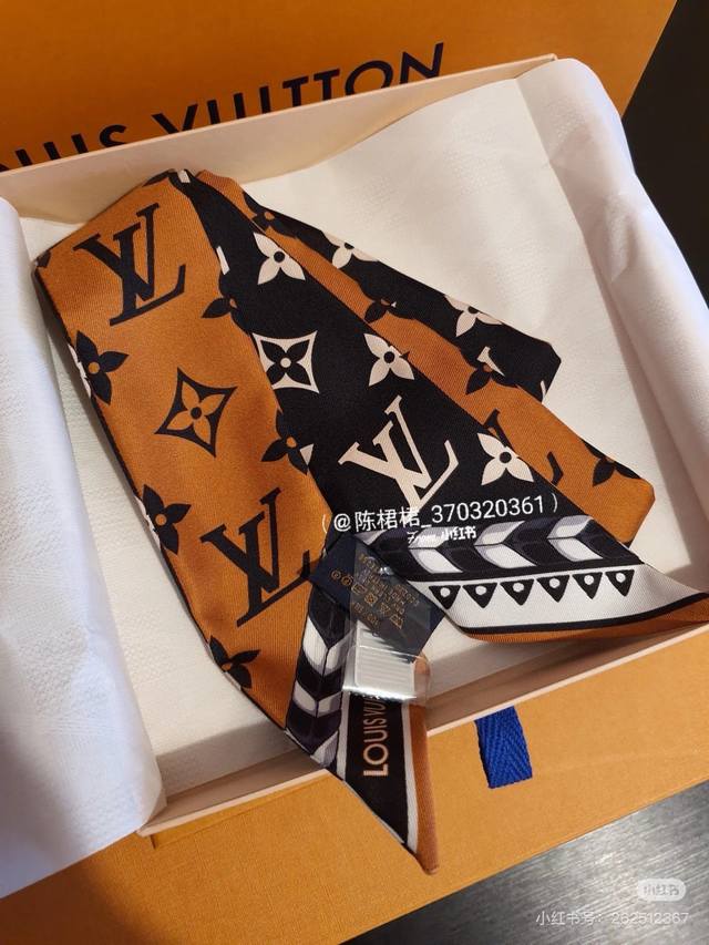 Available In Stores. Modern Ribbon Lv Crafty Bi Color Bb Hair Tie Reinterprets T