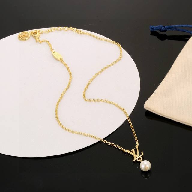 Louis Vuitton Letter Necklace, Crafted With Exquisite Artistry, Features A Polis