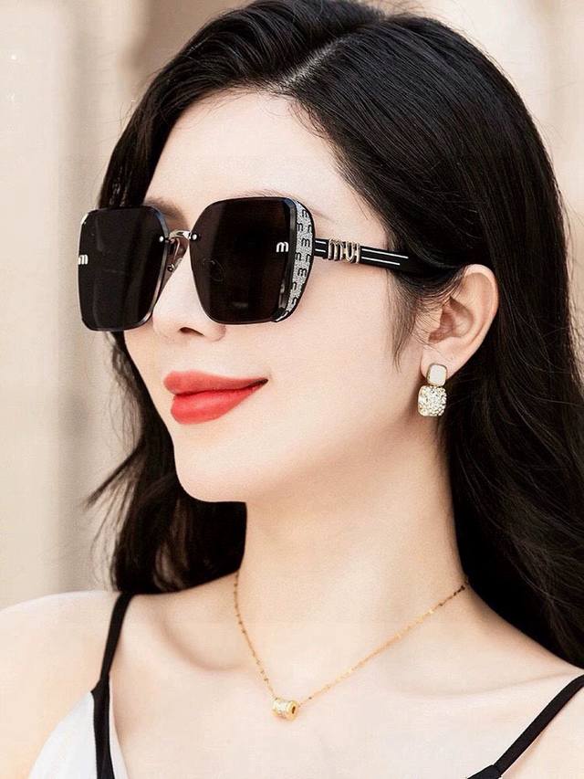 Miu Miu Oversized Polarized Sunglasses A Must-Have For Influencers And Street St