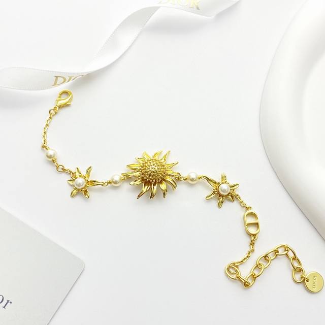 Dior Popular Bracelet Now Available. Dior 3D Embossed Golden Sunflower Cd Pearl