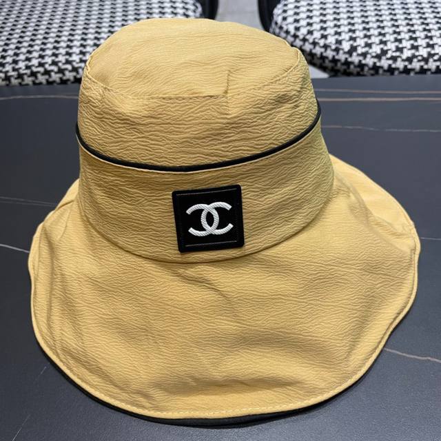 Chanel New-Style Mini Chanel-Style Foldable Fisherman's Hat, Unique Petal Design