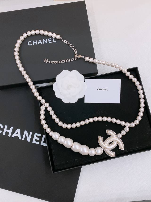 Chanel Metal, Resin, And Synthetic Pearls In Silver And Pearl White. An Exquisit