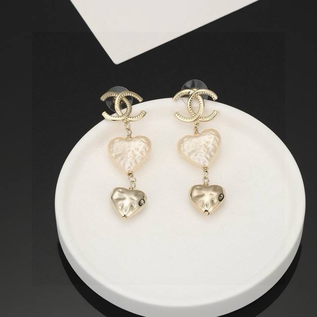 Chanel Light Gold Heart-Shaped Peach Earrings. Follow The Latest Trends With The