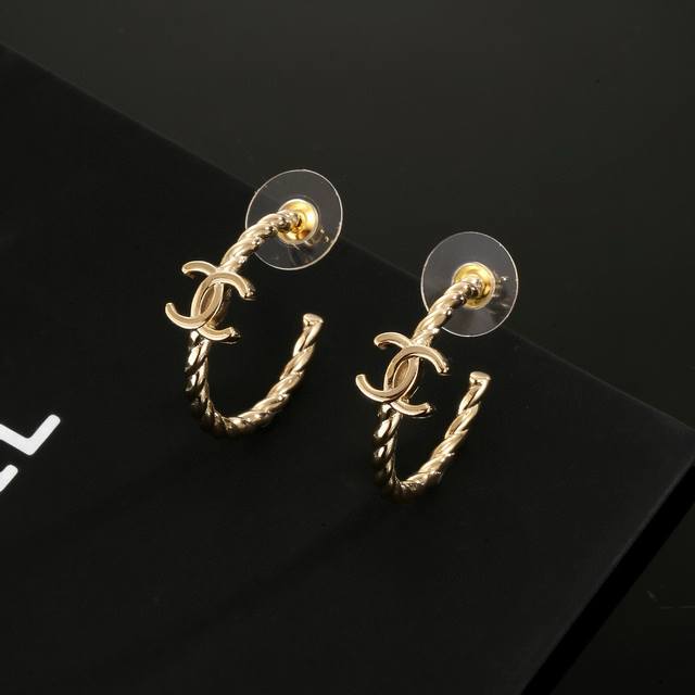 Chanel Classic Half-Circle Gold Double C Ear Studs. This Versatile Piece Is Incr