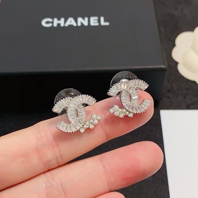 Chanel's Hottest New Arrival. A Unique And Fashionable Double C Earring With Dia