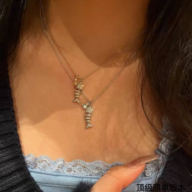 Queen Of The West Saturn Swing Fish Diamond-Studded Necklace The Timeless Saturn