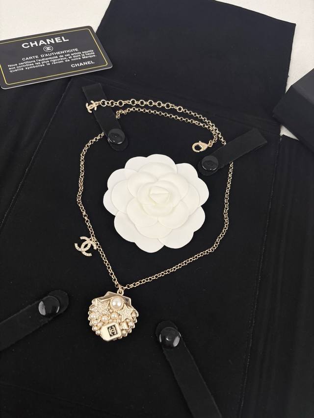 Chanel Full Diamond Star Shell Pearl Small Perfume Bottle Pendant Necklace.