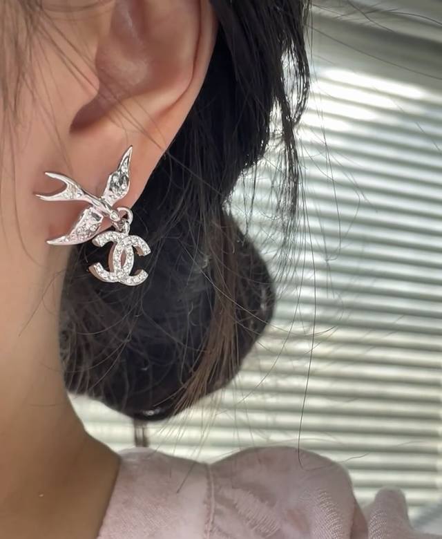 Chanel Silver Flying Bird Full-Diamond Double C Pendant Ear Studs.