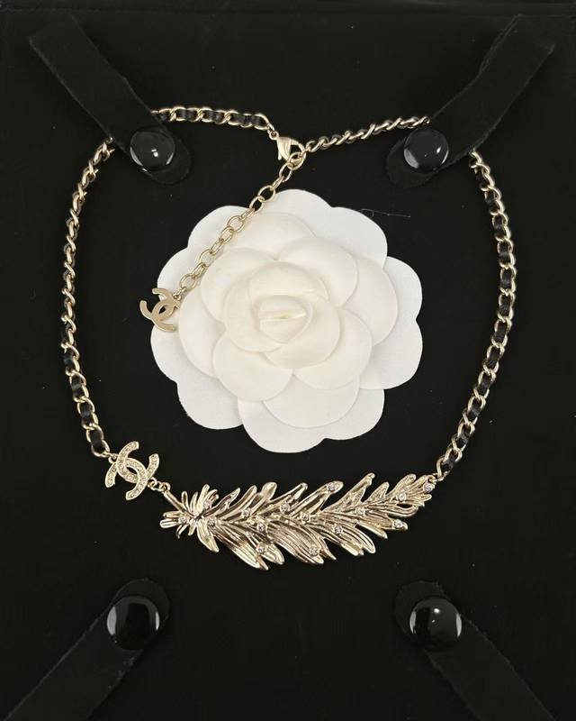 Chanel Light Gold Large Feather Crystal Double C Leather-Tied Necklace