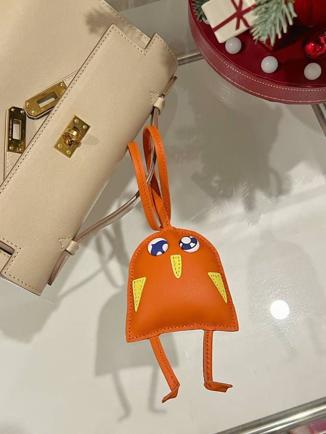 Herm S Little Chicken Pendant Wearing Reference Image