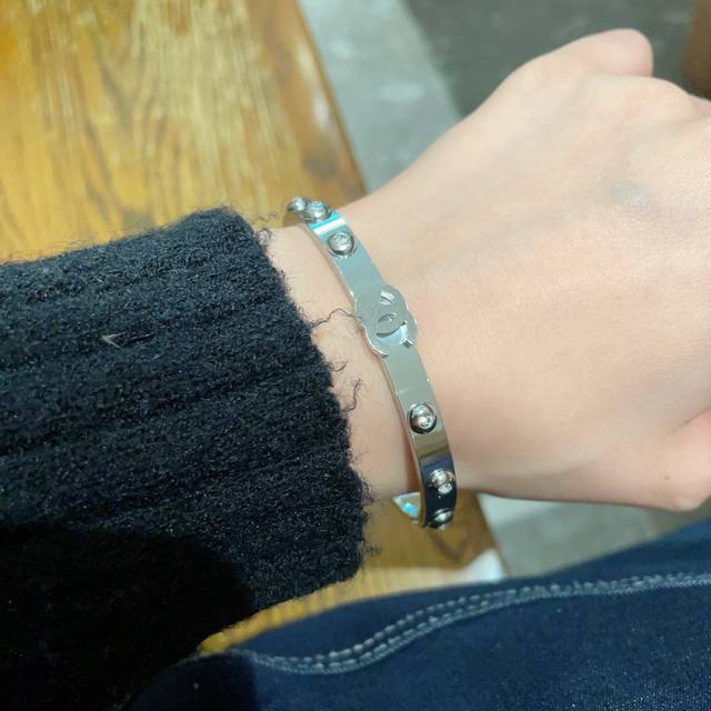 Chanel's Latest Camellia Double C Diamond-Encrusted Bracelet With Original Logo