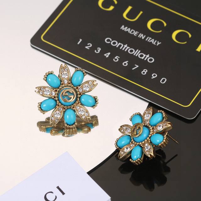 Gucci Double G Earrings As The Brand's Iconic Element, The Brand's Initials Are