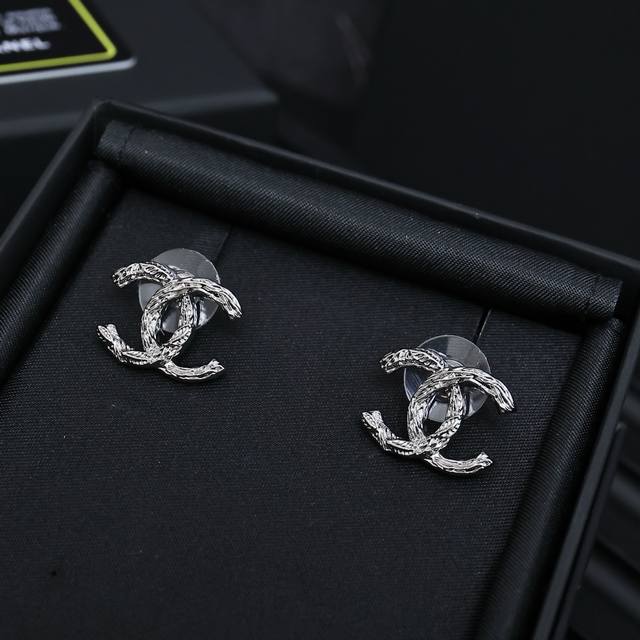 Chanel 25S Wheat Silver Double C Stud Earrings Minimalist Design, Timeless And V