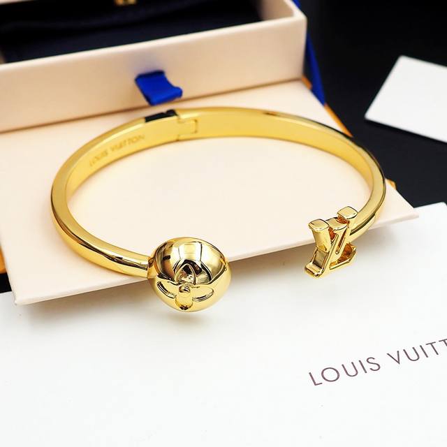 Louis Vuitton Louisette Signature Bracelet Features A Dazzling Metal Open Design