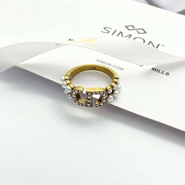 Code R052 Dior's New Best-Selling Ring Is Now Available. Vintage Gold Cd Letter