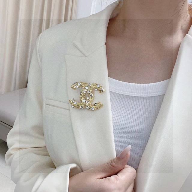 Chanel's New Full-Diamond Golden Brooch Is The Ultimate Accessory For Women Who