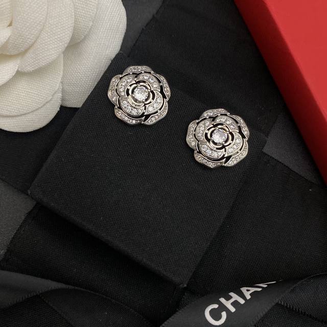 Chanel This Design Is Absolutely Stunning. Chanel's Camellia Earrings Feature La