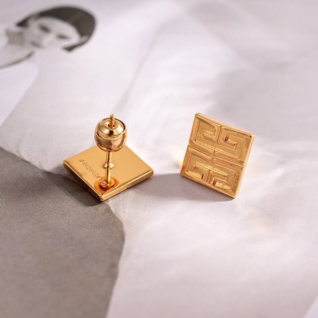 Givenchy Earrings. The Iconic Infinity Symbol Is Enhanced With A Touch Of Sophis