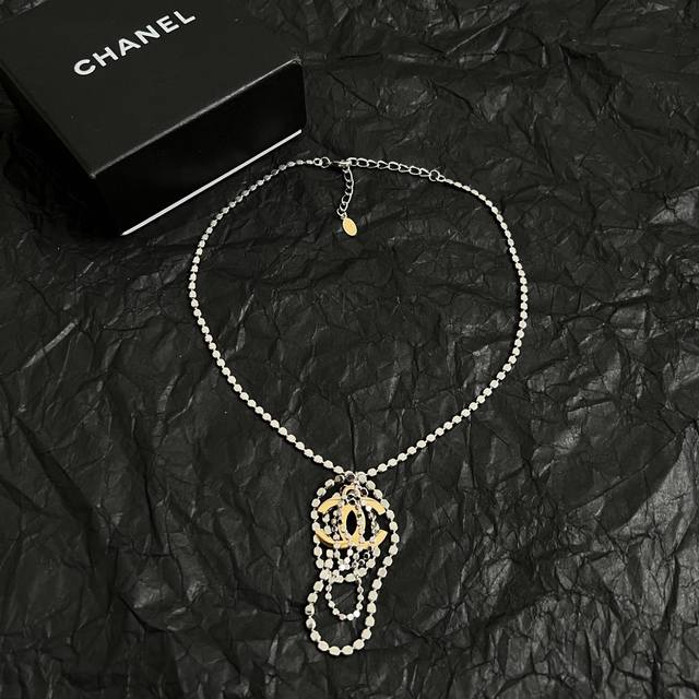 Chanel Pre-Owned Necklace. Chanel's Classic Designs Truly Need No Introduction E