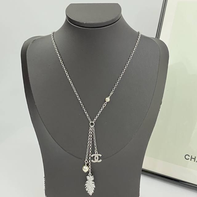 Chanel Necklace Bestseller Now Available! Chan 25 Silver Feather Double C Pearl