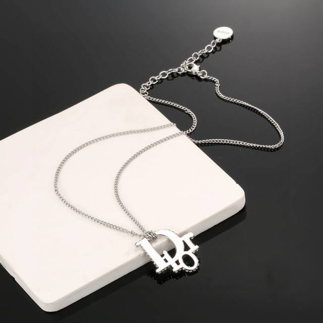 Dior's Beloved Jadior Dior New Necklace Features Bold Metal Lines With A Neutral