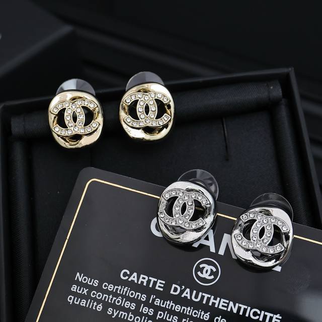 Chanel Chanel 25S Openwork Double C Stud Earrings. The Openwork Design Gives An