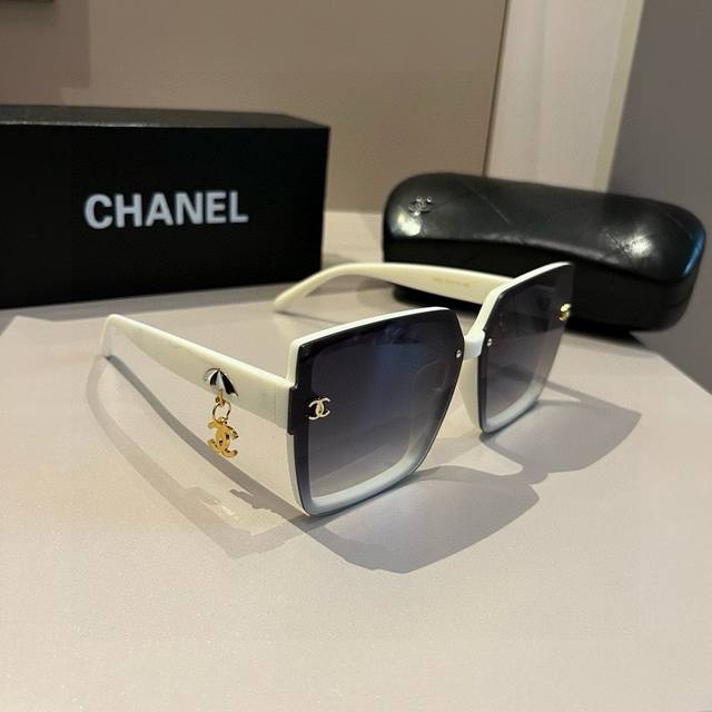 Chanel Sunglasses With Pendant Logo