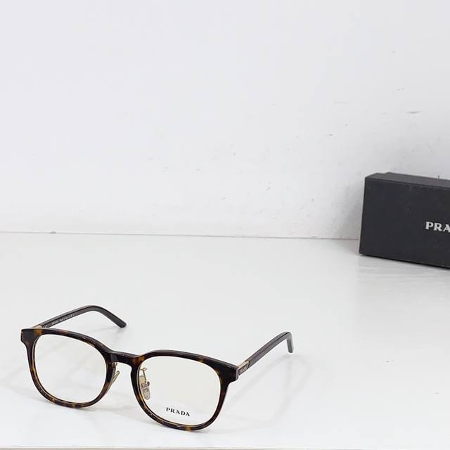 Prada Vpr12Z 51-20-140 Square-Round Frame Prescription Glasses Frame. The Minima