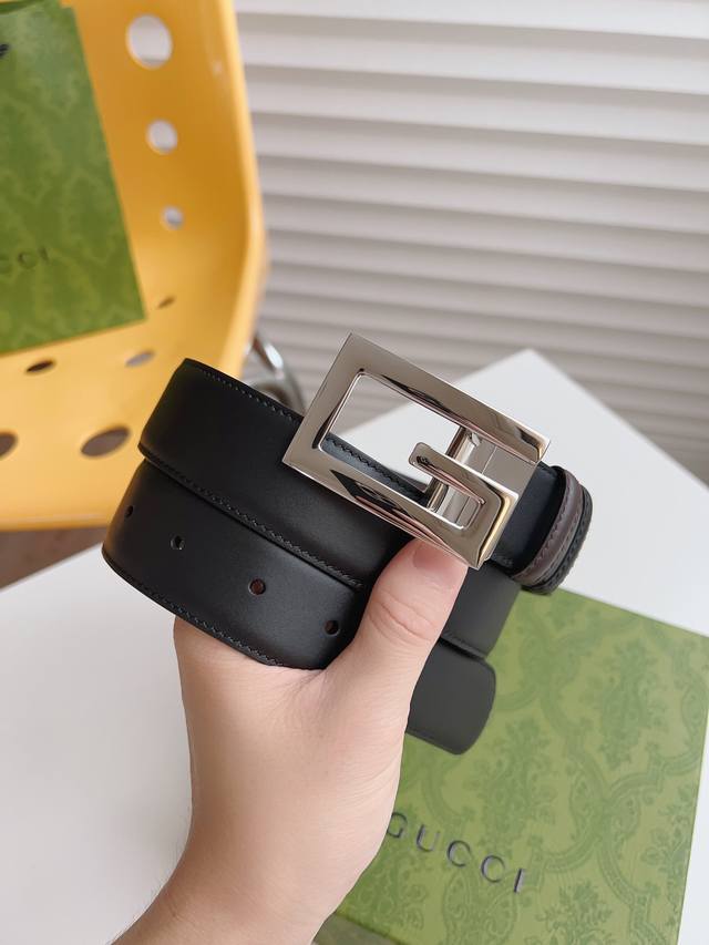 Gucci Black And Brown Double-Sided Calfskin Belt.